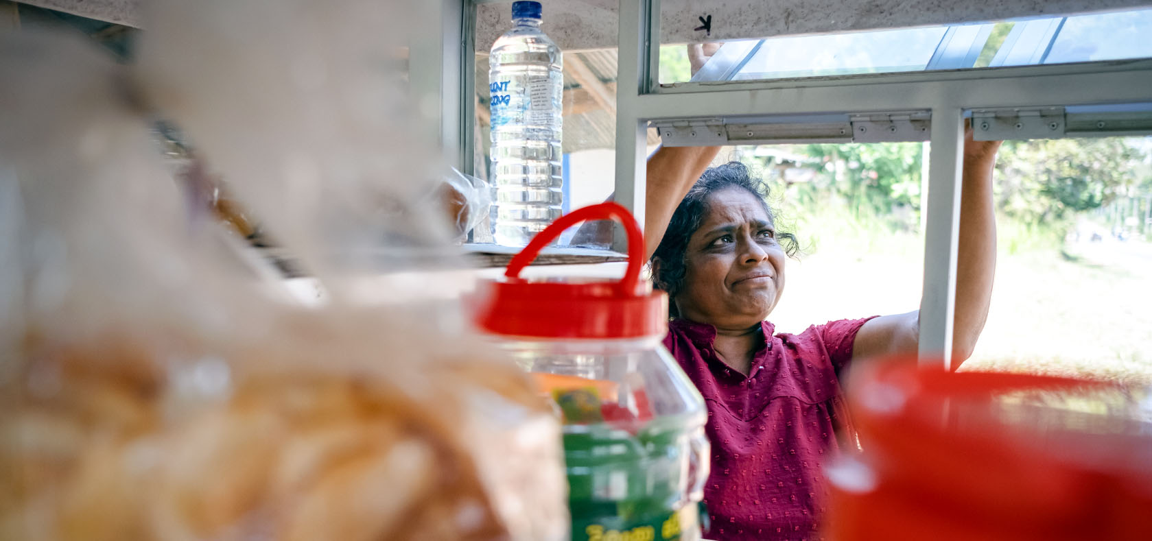 Kamalawathi sells a variety of everyday Sri Lankan snacks using the vending cart provided by UN Women. Photo: UN Women Sri Lanka/Ruvin De Silva