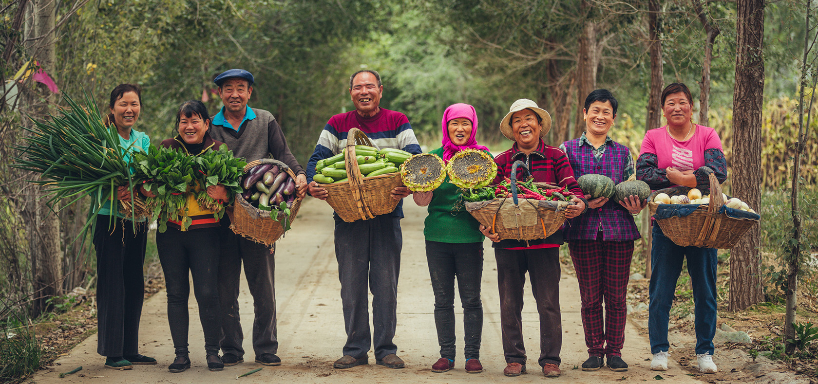 Women with their agriculture products in Guanglin Agriculture Cooperative. Photo: UN Women/Qiu Bi