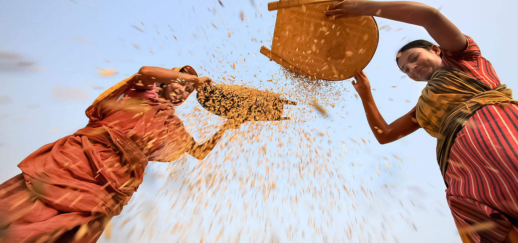Rice processing in Bangladesh. Photo: UN Women/M. Yousuf Tushar