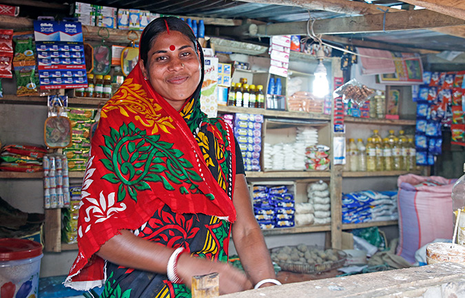 Sita Rani with her grocery shop in Rajnagar, eastern Bangladesh. Photo: UN Women/Asma Afrin Haque