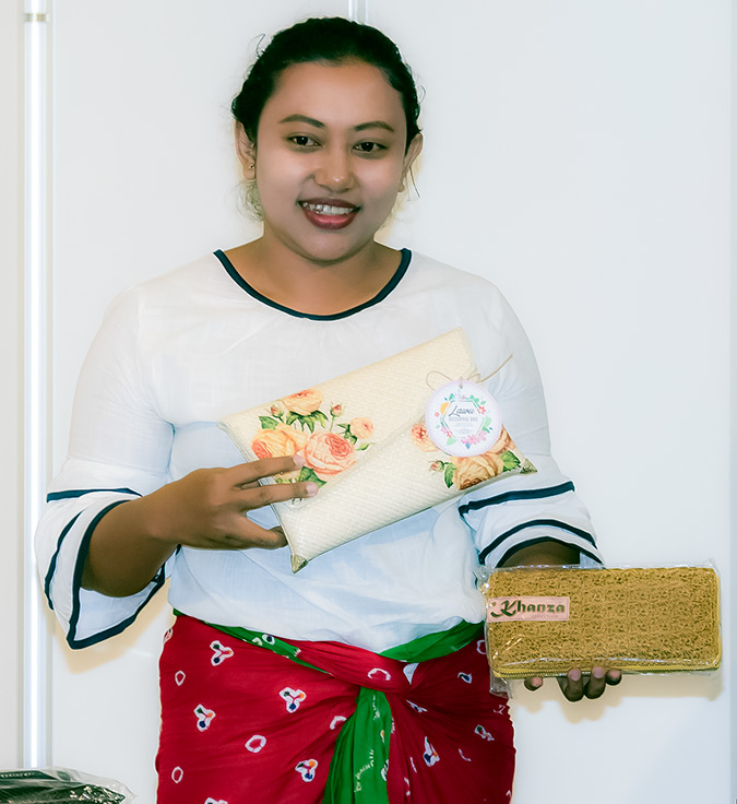 Anita shows off her handicrafts, developed with the support of UN Women's programme. Photo: UN Women/STORY CO., LTD