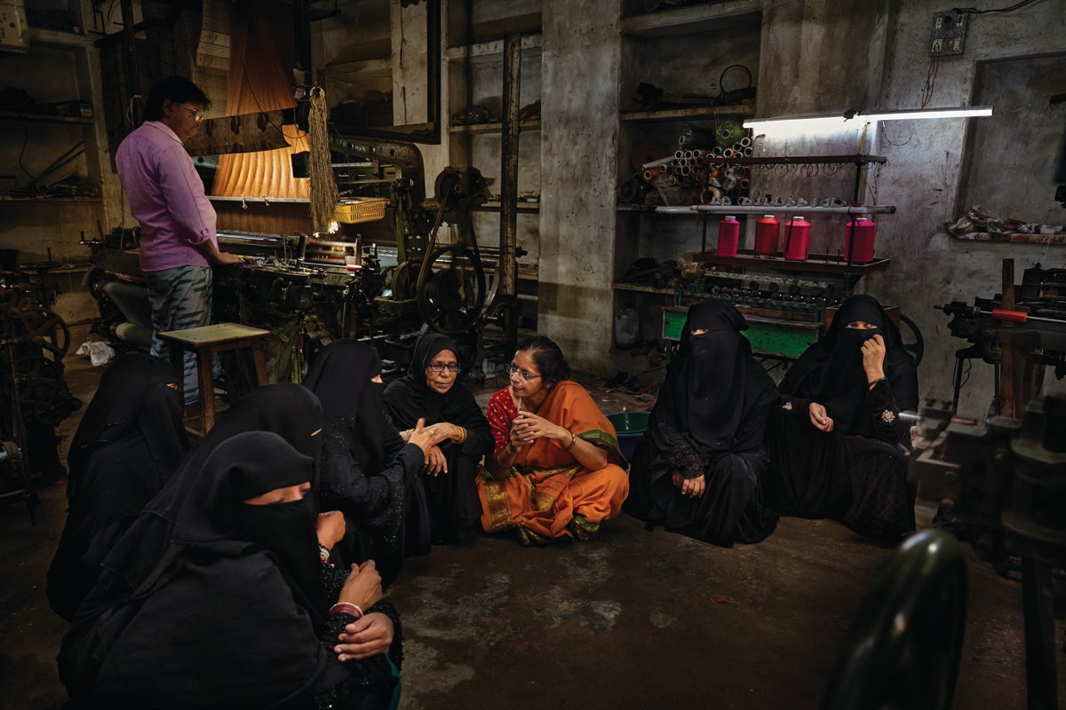 Social activist Shruti Nagvanshi, counseling women weavers on nutrition, basic rights, and gender-based violence in Varanasi, Uttar Pradesh, India.