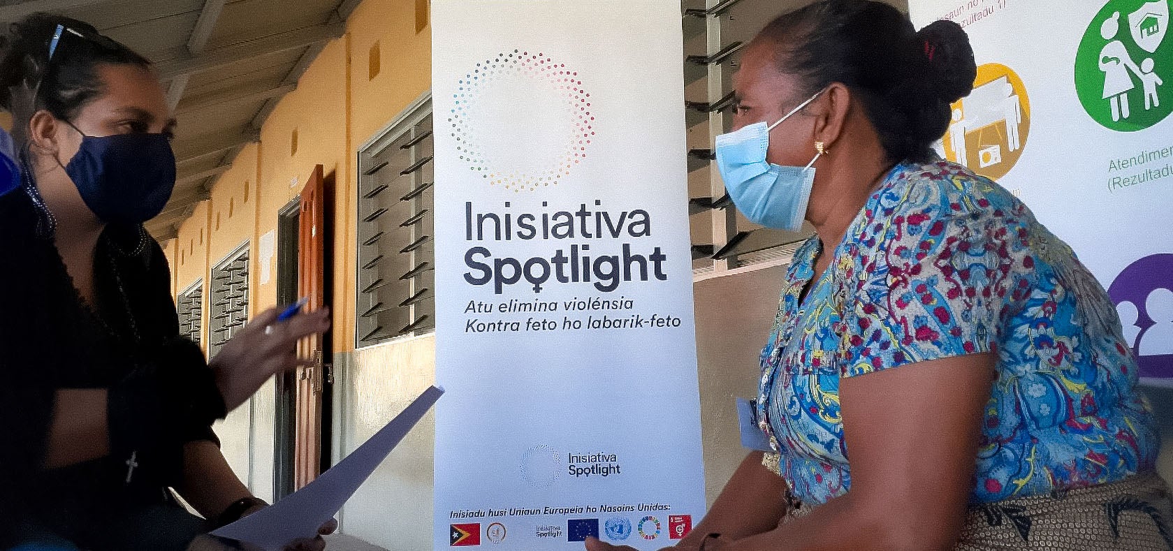 UN Women staff member Gerdrudes Abedita helps a mother complete a form during a Positive Parenting Session in Bobonaro municipality of Timor-Leste on 28 September 2021. Photo: UN Women/Helio Miguel