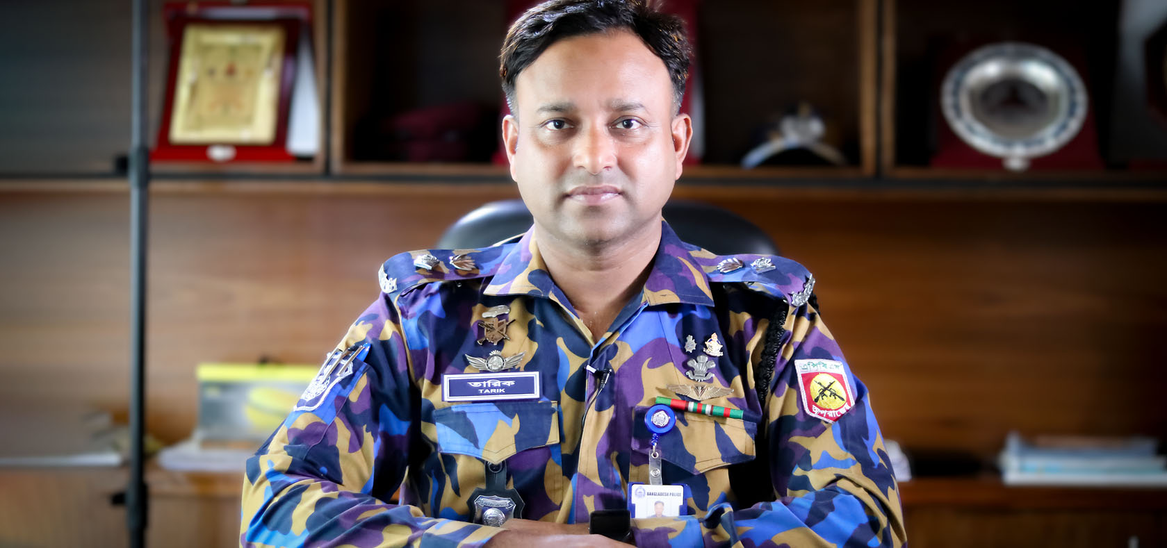 Tarikul Islam, Superintendent of Police at Bangladesh Police’s Armed Forces Battalion in Cox’s Bazar, Bangladesh, poses at his office on 9 June 2021. Photo: UN Women/Mahmudul Karim
