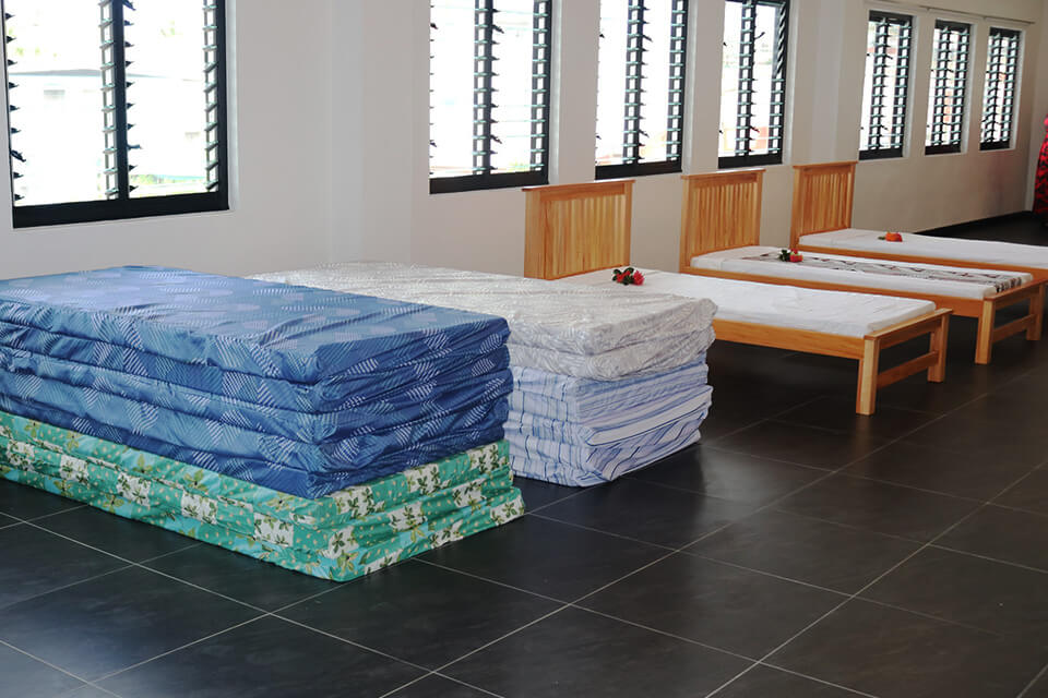 Beds being set up at new Nausori Market Accommodation Centre