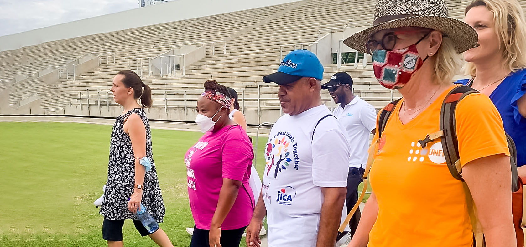L-R Caroline Nyameyemombe, UN Women Deputy Country Representative, Governor Powes Parkop and Marielle Sander, UNFPA Country Representative lead the march to kickstart the International Women’s Day 2022 celebrations in Papua Neew Guinea on March 6, 2022. Photo: UN Women/Aidah Nanyonjo
