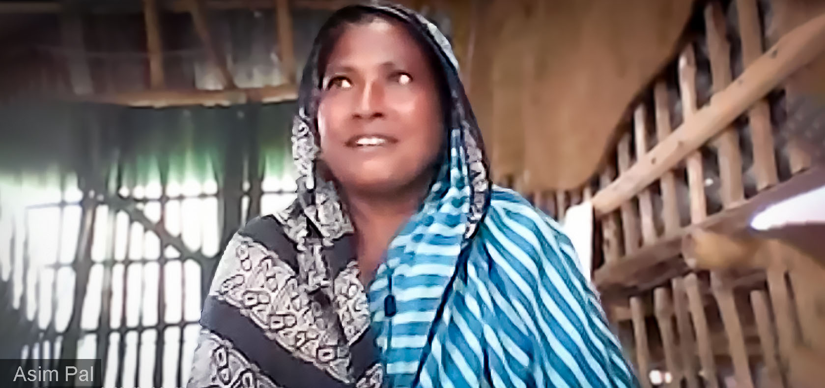 Reti Khatun, in Kulpala village, Bangladesh, speaks during a 30 May video meeting with representatives of the Government of Sweden and UN Women, which have helped farmers like her find economic security amid the country’s volatile weather. Screenshot: UN Women