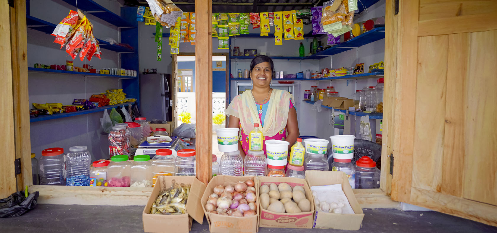 Mathan Justin Annamma stands at the shop. Photo: UN Women Sri Lanka/Raveendra Rohana