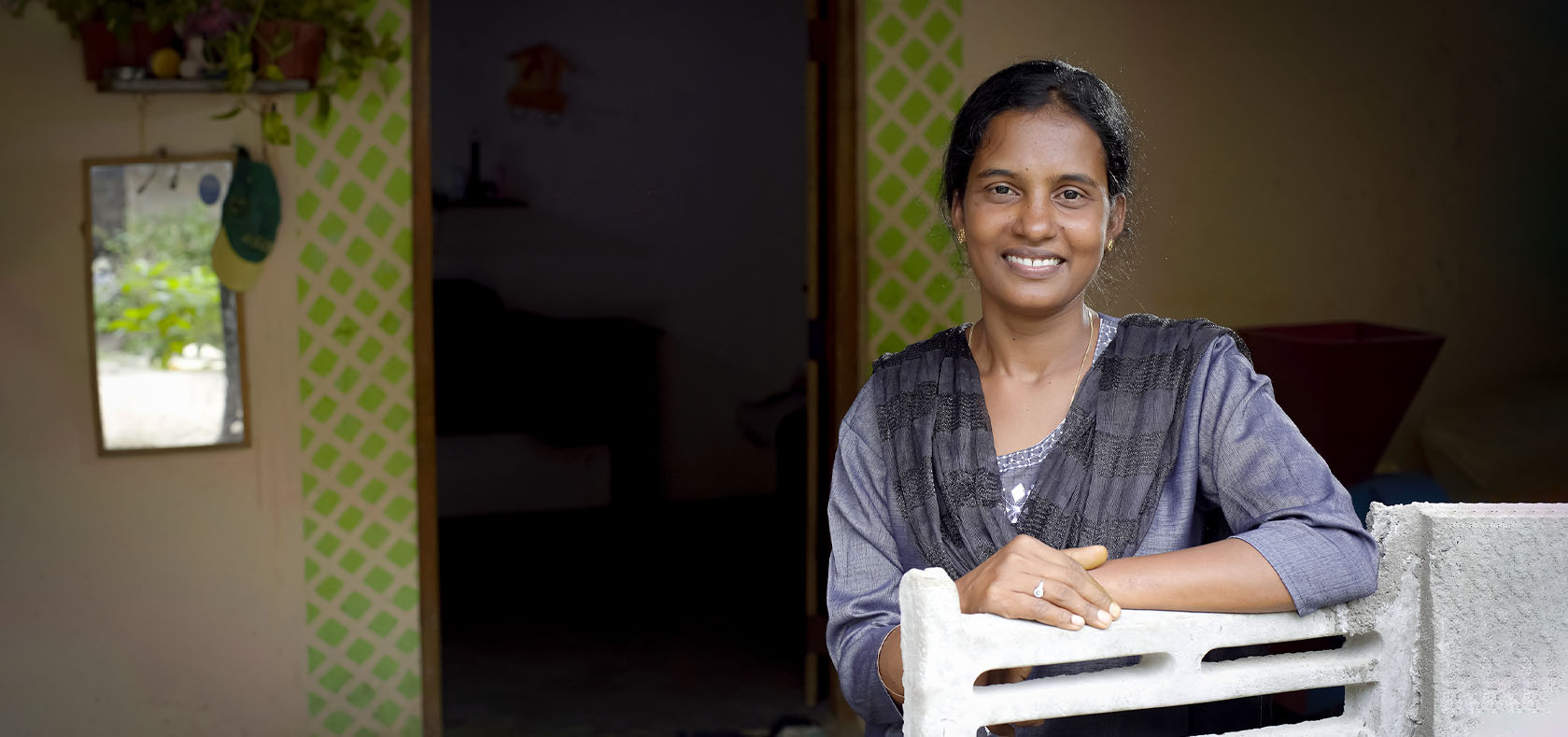 Uma Maheswary poses at her home in Eluthoor, Mannar in the Northern Province of Sri Lanka. Photo: UN Women Sri Lanka/Raveendra Rohana