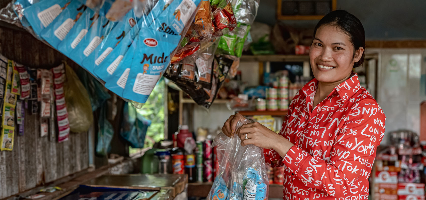 Chhann Koury now runs a successful grocery store business after UN Women training. UN Women/Ploy Phutpheng