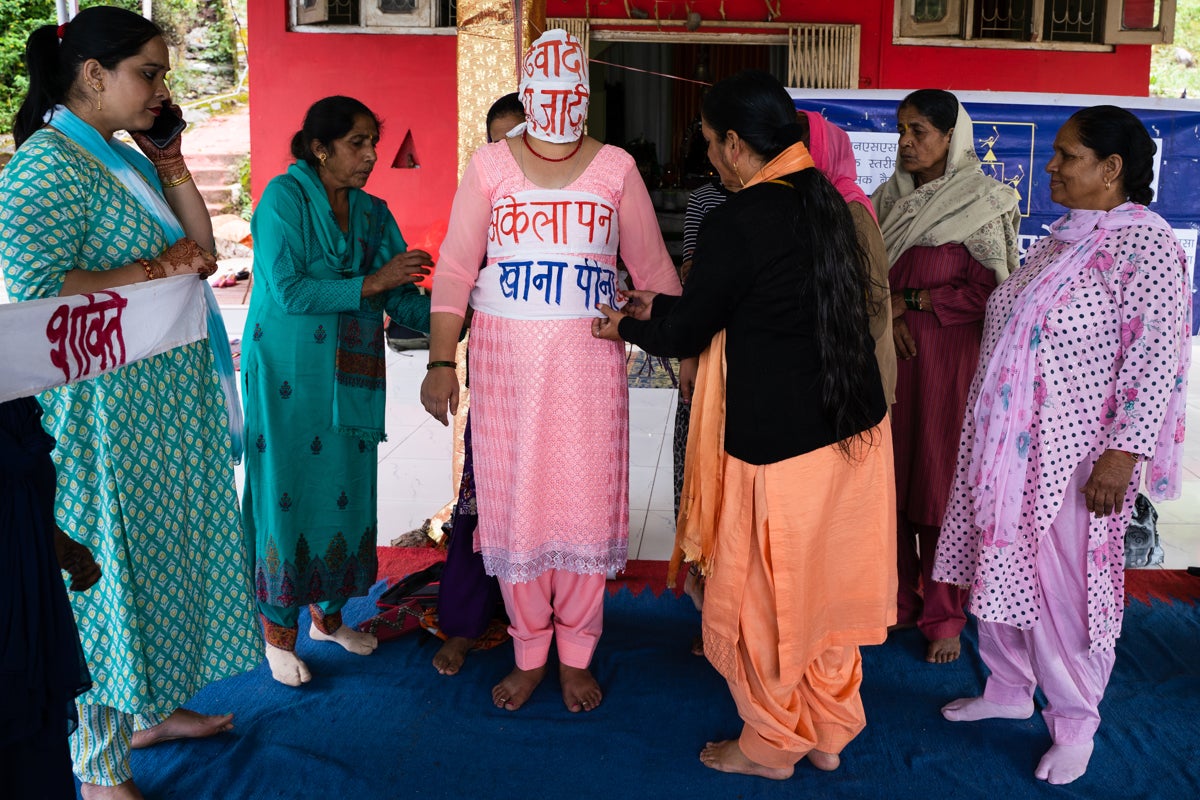 Nirmal Chandel, 57, conducting a monthly awareness meeting in Solan district. During these meetings new members are welcomed and briefed on various government schemes that benefit women. Women are also made aware of their basic rights. 