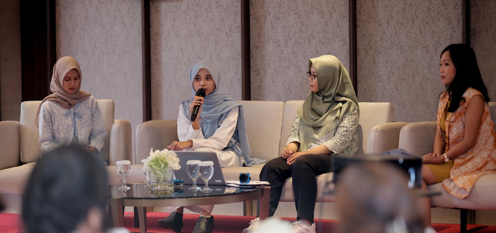 Talk show with Anindya Dewi Nareswari, Digital Sheroes Best Participant (left), Adinda Putri Kusumawardhani UN Women National Gender Youth Activist (middle), Widuri, Deputy Director of ICT Watch (second right) moderated by Isma, Alterra Academy (right) on artificial intelligence (AI) and gender bias in AI. Photo: UN Women/Putra Djohan