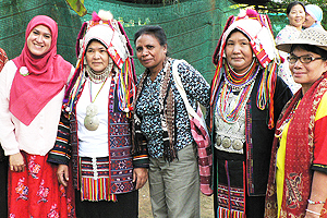 Indigenous women from three areas of Indonesia meet with women from Thailand’s Akha hill tribe, during the participants’ trip to a tribal village in Chiang Mai. Photo: UN Women/Jo Baker