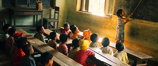 Children from the countryside of Myanmar are learning and teaching their lessons.Wen need to promote the education of children for our future.