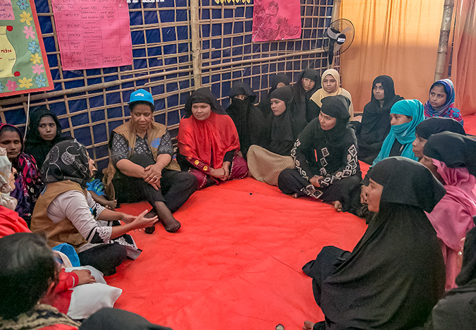 UN Women Executive Director, Phumzile Mlambo-Ngcuka meets with women at a UN Women-supported Action Aid Women Friendly Space in Balukhali Rohingya Refugee camp in Chittagong division, Bangladesh. Photo: UN Women/Allison Joyce