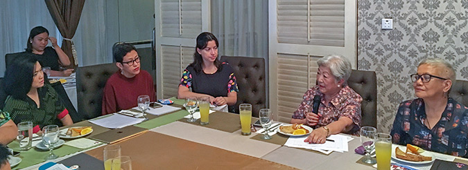 UN Women's Regional Director hears from Ana Maria Nemenzo, WomanHealth, and Teresita Quintos-Deles, former adviser to the President on the peace process, about the need for more young women to enter politics in the Philippines. Photo: UN Women/Minjeong Ham