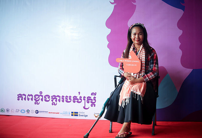 Ms. Sor San, businesswoman joint the International Women's Day in Cambodia with the message: "Being a woman with disability is my pride. I am a woman and was born with a disability, but I engage and participate a lot in the society which makes me brave and makes me feel that I am not lonely."  Photo: UN Women/Sreynich Leng