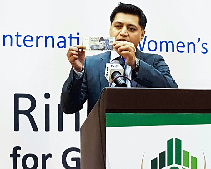Jamshed Kazi, Country Representative of UN Women Pakistan, speaks at the Ring the Bell Ceremony. It's time we put a picture of a woman on the rupee note, he said. Photo: UN Women/Faria Salman