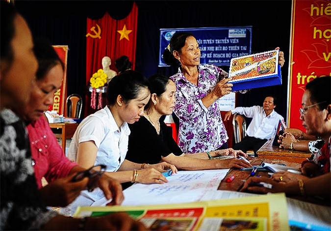Local women’s groups in Ca Mau, Viet Nam, in a group meeting on disaster management. Photo: UN Women Viet Nam