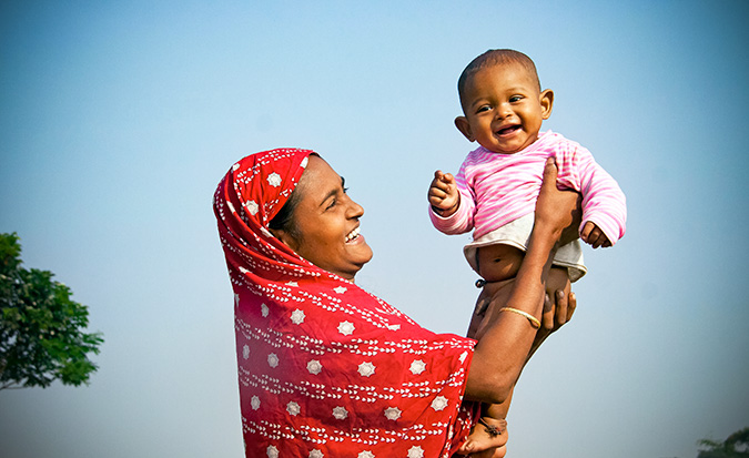 Shamsun Nahar Khatun (29)  pose for a photograph  with her child, Netrakona, Bangladesh. Photo: UN Women/Saikat Mojumder