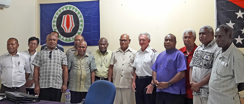 The President of the Autonomous Bougainville Government, John Momis, sixth from right, poses with members of the PNG Council of Churches on 24 August in Buka. They discussed how the churches can help keep Bougainville’s upcoming referendum violence-free. Photo: UN Women/June Su