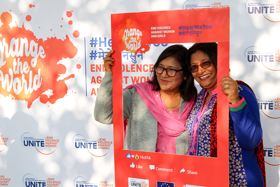 Participants at Province 7 take pictures with the #HearMeToo frames. Photo: UN Women/Anders Magnusson