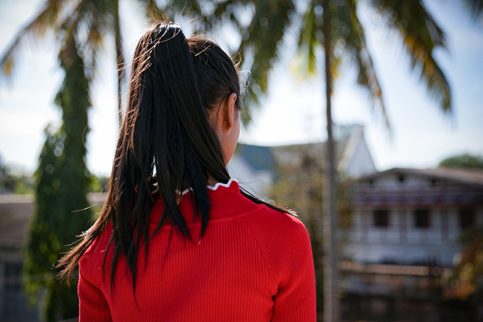 Aung Ja* was 18 when a woman from Myitkina, northern Myanmar, convinced her to take a ‘factory’ job in China. She was rescued in 2017 and is taking part in a UN Women-supported trafficking prevention programme. Photo: UN Women/Stuart Mannion