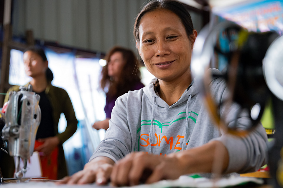 Khawng Tse, a 35-year-old internally displaced person (IDP) from Ayeyar Ward in the city of Myitkyina, Khawng Tse is completing her sewing classes and will receive a sewing machine from Htoi, with the support of UN Women. She hopes to set up her own tailoring business. Photo: UN Women/Stuart Mannion