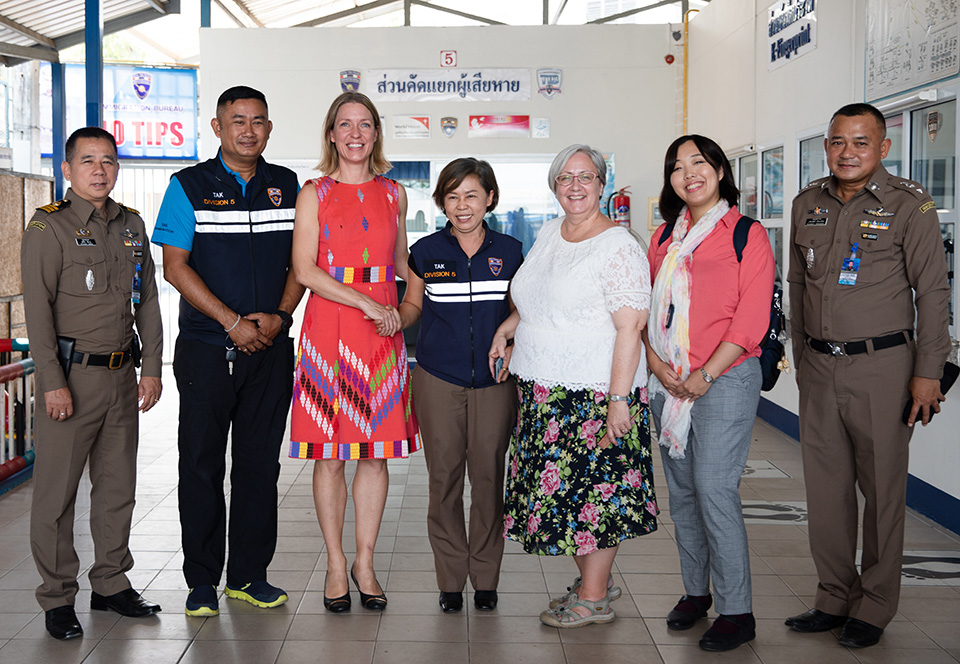 Immigration and border officials in Mae Sot, Thailand provide a tour of facilities to Anna Karin Jatfors, UN Women Asia Pacific Regional Director, a.i. (third from left); HE Donica Pottie, Canadian Ambassador to Thailand (third from right); and Ms. Mami Ueno, First Secretary, Japanese Embassy to Thailand (second from right). Photo: UN Women/Stephanie Simcox