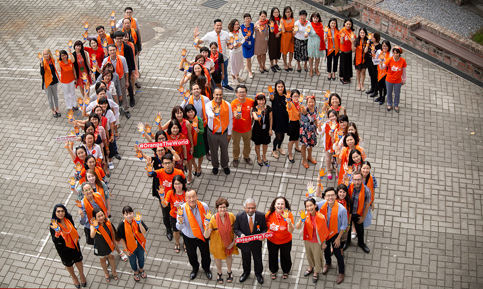 UN leaders and staff united in orange to show their commitment to increasing efforts to end violence against women and girls. Photo: UN Women/Doan Thanh Ha