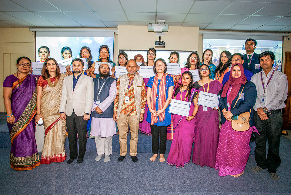 Female students from BRUR proudly display their seed funding awards at the Women Peace Café launch event in Rangpur. Photo: UN Women/Fahad Kaizer