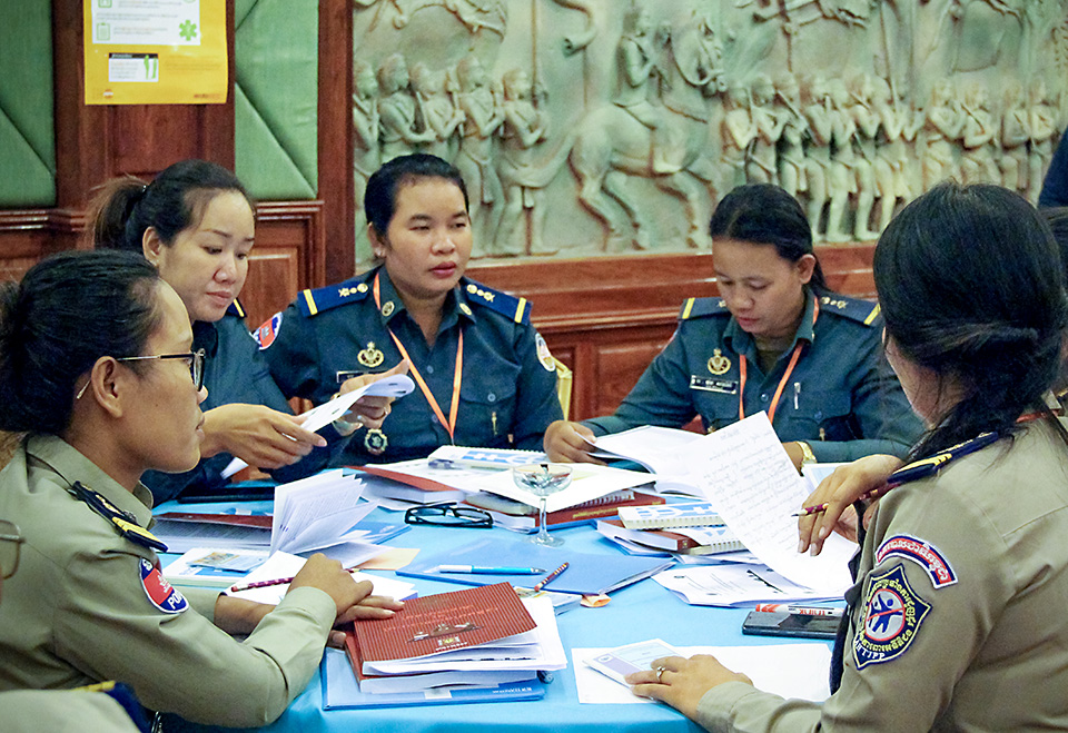 Police officers and gendarmeries participate in a UN Women-organized workshop on identifying and interviewing survivors of gender-based violence and human trafficking. The training was held in 12 provinces of Cambodia in April 2019. Photo: UN Women/Vutha Phon