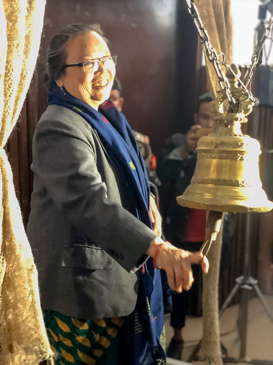 Tham Maya Thapa, former Minister of Women, Children and Senior Citizen, ringing the Nepali bell to launch the national consultation for Beijing+25 review organized by National Network of Beijing Review Nepal (NNBN) with UN Women’s support. Photo: UN Women/Naresh Newar