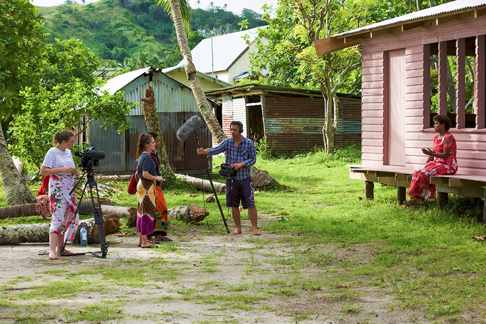 The filmmakers interview a woman in Batiki village during the making of the documentary. Photo: Courtesy of Massey University, New Zealand