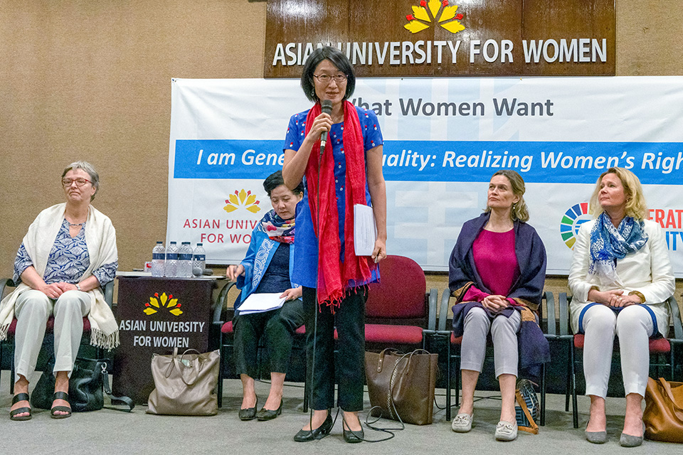 Shoko Ishikawa, Country Representative of UN Women Bangladesh, moderates the panel discussions on Breaking the Glass Ceiling and on Feminism from West to East. Photo: Lauren Kana Chan/Asian University for Women