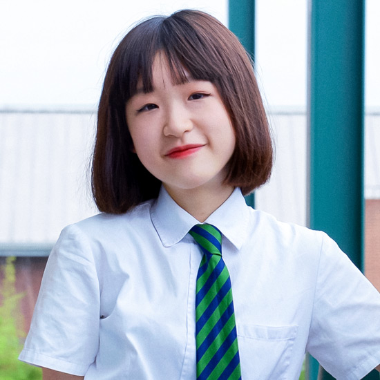 Jenny Mei poses at her school in Shanghai, China, on Year 9 graduation day, on 17 June 2021. Photo courtesy of Angel Xia