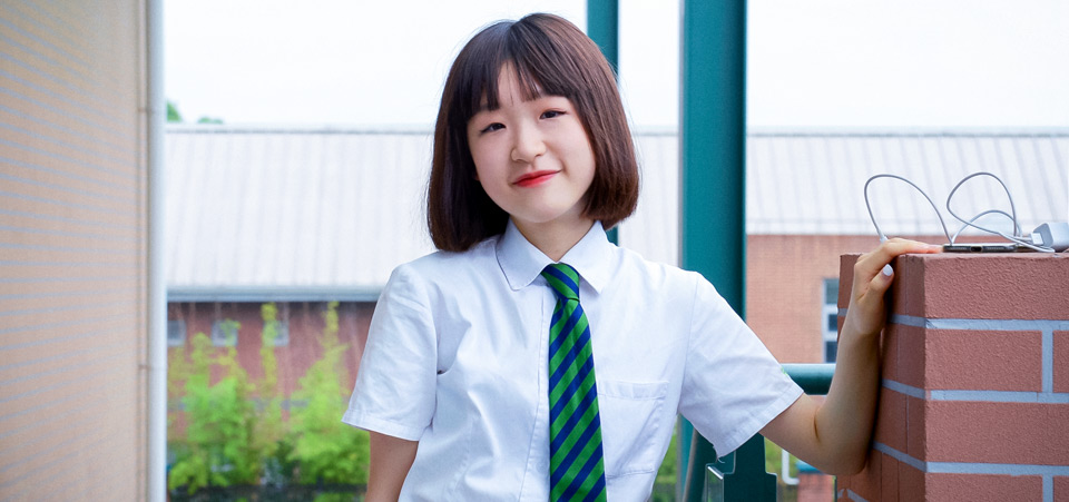 Jenny Mei poses at her school in Shanghai, China, on Year 9 graduation day, on 17 June 2021. Photo courtesy of Angel Xia