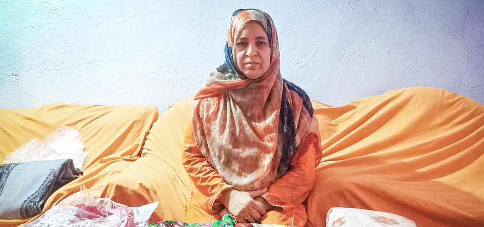 Bushra Abdullah shows bundles of her embroidery work on 17 July 2021 in Multan, Pakistan. Photo: Kaarvan Crafts Foundation/Muhammad Zameer