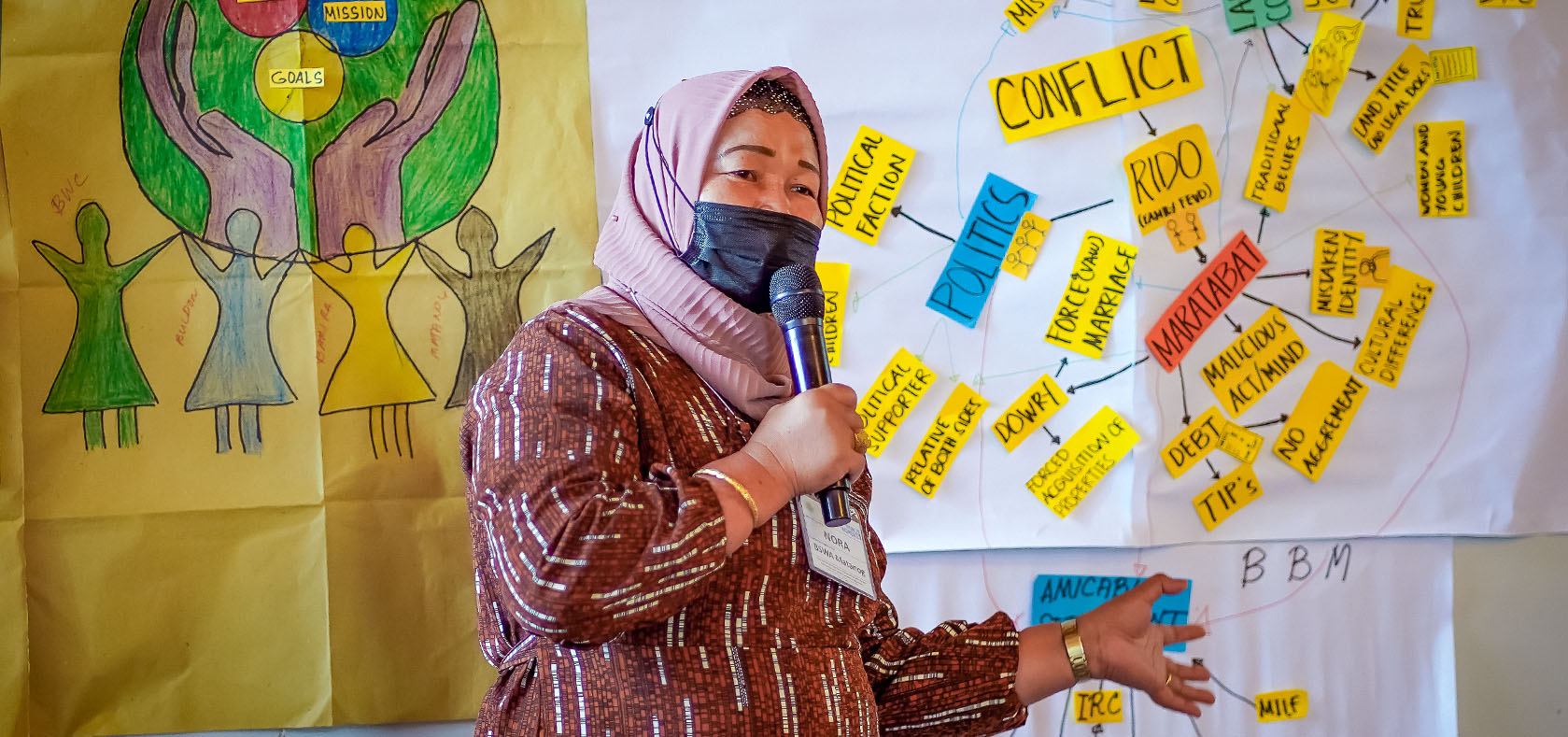 Nora Zacaria, of the civil society organization Barira, Buldon, Matanog Group of Women from Maguindanao, participates in a discussion on conflict at an event organized by UN Women. The Action Planning for Women Leaders on Conflict Affected Areas was held in Lake Sebu, South Cotabato, Philippines, on 3 August, 2021. Photo: UN Women/Louie Pacardo