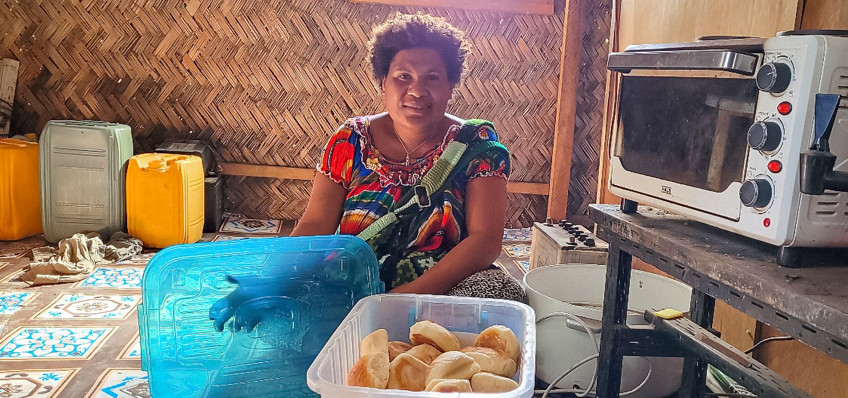 Teiyo preparing buns for sale Photo: UN Women/Goodshow Boote