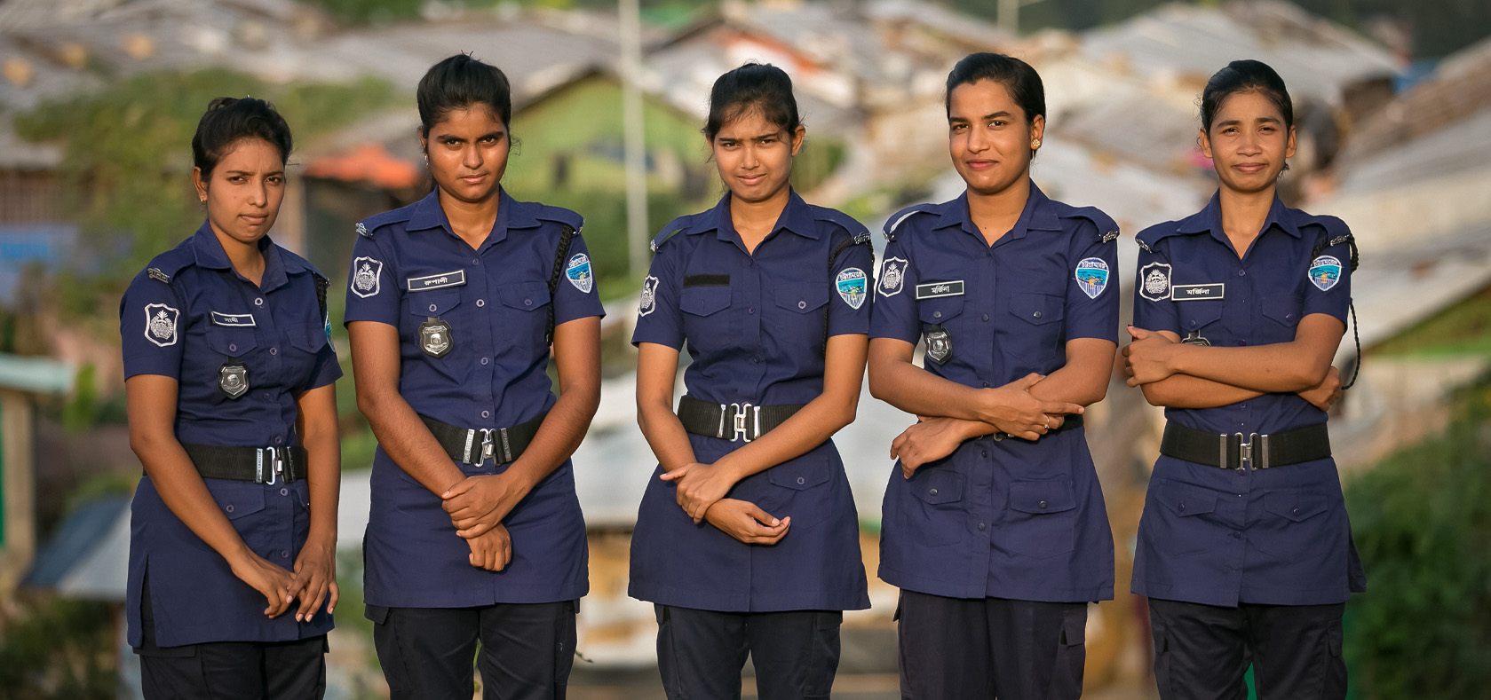 Bangladeshi women police pose for a photo at their duty station in 2019. Photo: UN Women/Allison Joyce