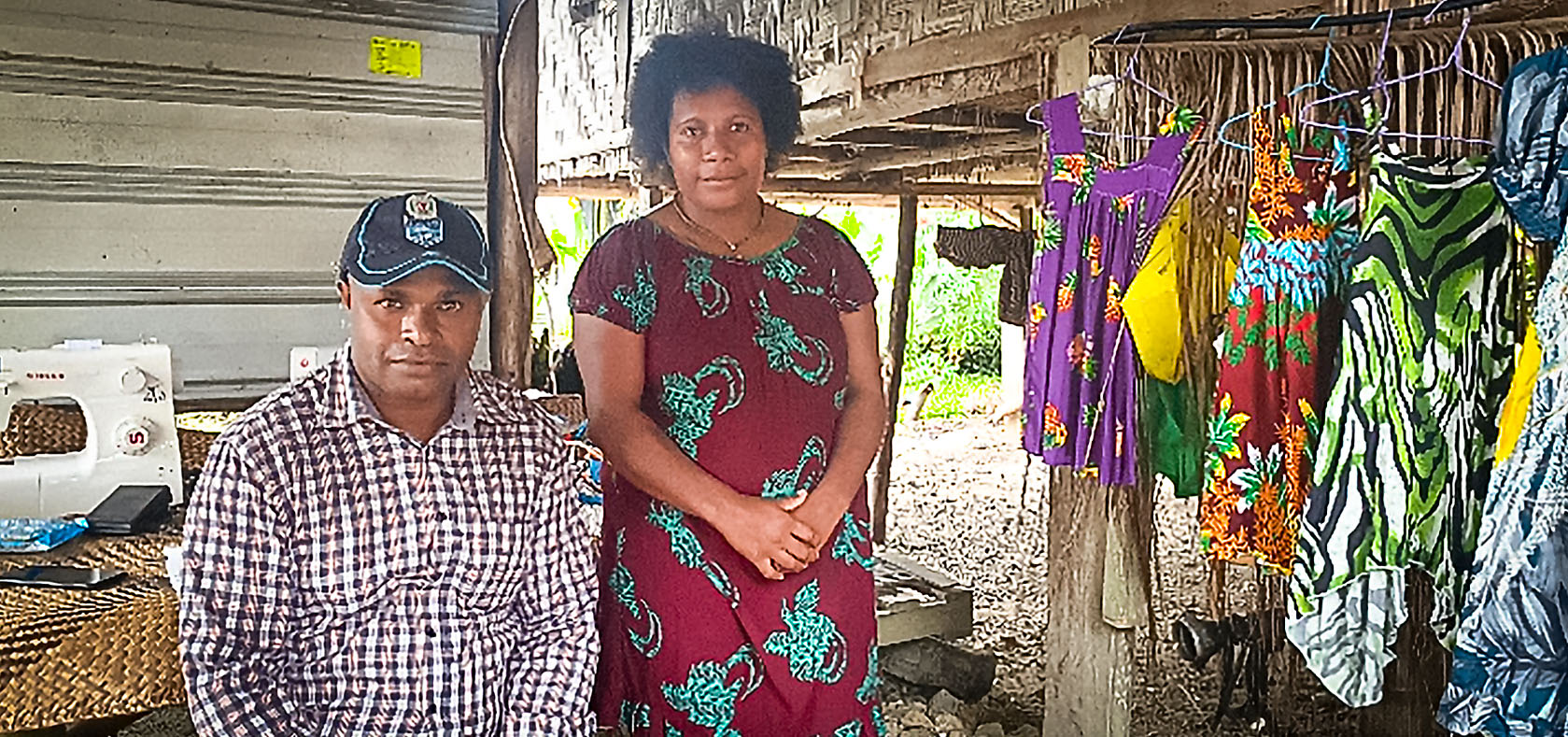 Lilian and Joseph Laki pose at her stall in Wewak market in August 2020. Photo: UN Women/Goodshow Bote