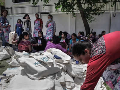 Nepal volunteers preparing dignity kits