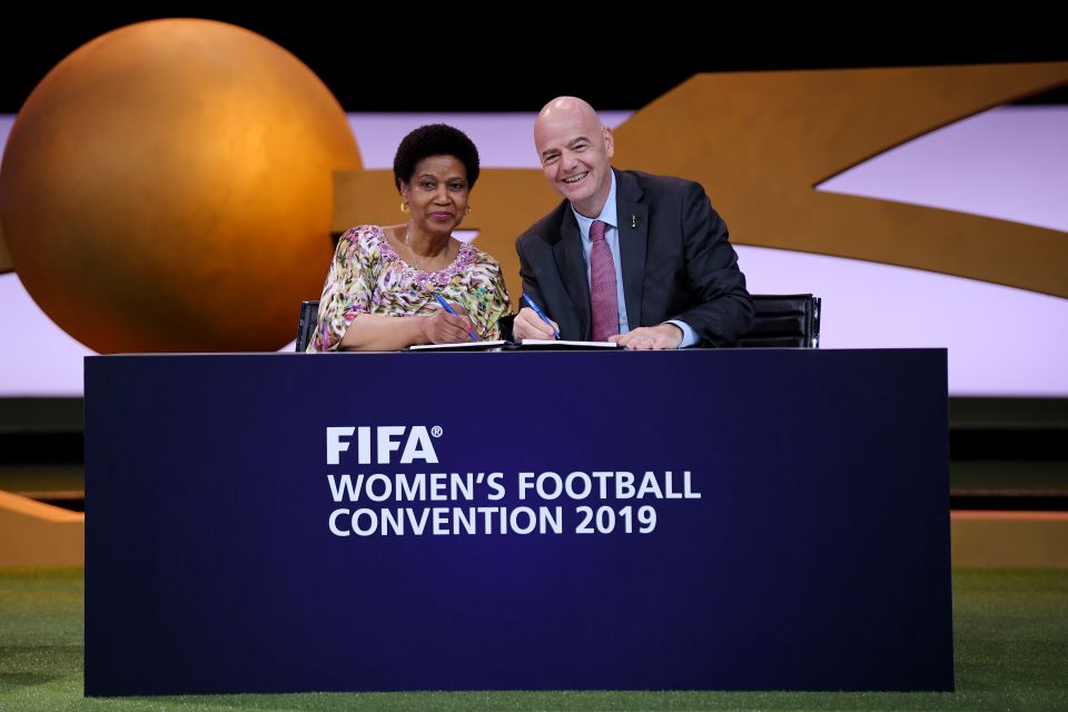 Gianni Infantino, FIFA President (R) and Phumzile MIambo-Ngcuka, United Nations Under-Secretary-General and Executive Director of UN Women (L) sign a Memorandum of Understanding during the FIFA Women's Football Convention  in Paris, France. Photo: Mike Hewitt - FIFA/FIFA via Getty Images