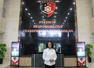 Brigadier General Nurul Azizah, Director of Women and Children Protection and Trafficking in Persons Crimes at the Criminal Investigative Agency of the Indonesian National Police, poses at her workplace
