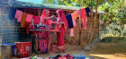 Shamshun Nahar sells her products in front of her clothing business at her house in Ukhiya, Cox’s Bazar, 2024. Photo: OXFAM/Nishat Tasnim