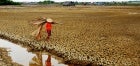 Climate change with prolonged drought days leaves farmers' fields dry and cracked in Dong Thap province, Viet Nam. Photo: UN Women/Nguyen Ngoc Hai