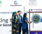Rural women from Tharparkar in Sindh Province ring the bell at the Pakistan Stock Exchange. Photo: UN Women/Faria Salman