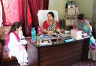 Ek Maya B.K., centre, Vice Chair of Khajura Rural Municipality in Banke, Nepal, meets with UN Women officials in her office on 28 June 2018. During the discussion, she highlighted the challenges and opportunities of women in leadership positions in Nepal.