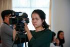 A broadcast journalist participating in the November workshop shoots a simulation of a talk show on gender, climate change and natural disasters. Photo: UN Women Viet Nam